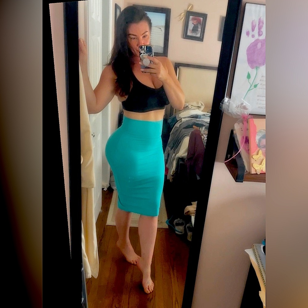 BeBe skirt high waisted, very compressive, so holds everything in 😉